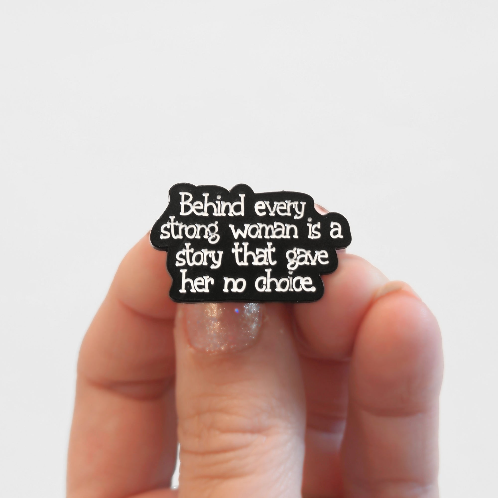 Behind Every Strong Woman Is a Story That Gave Her No Choice | Collectible Pin - NovaSmartLinks