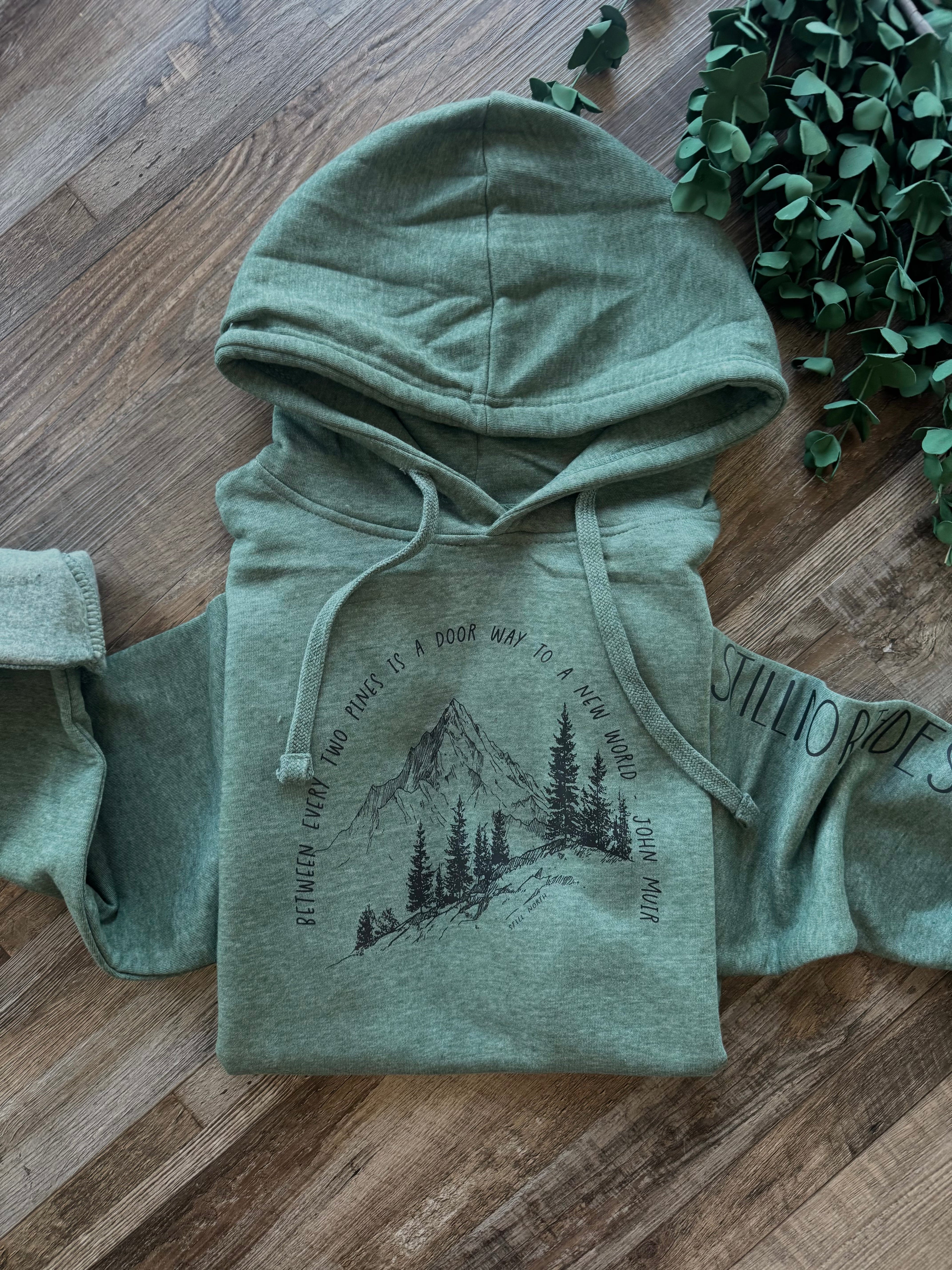 2025 BETWEEN TWO PINES HOODIE - NovaSmartLinks